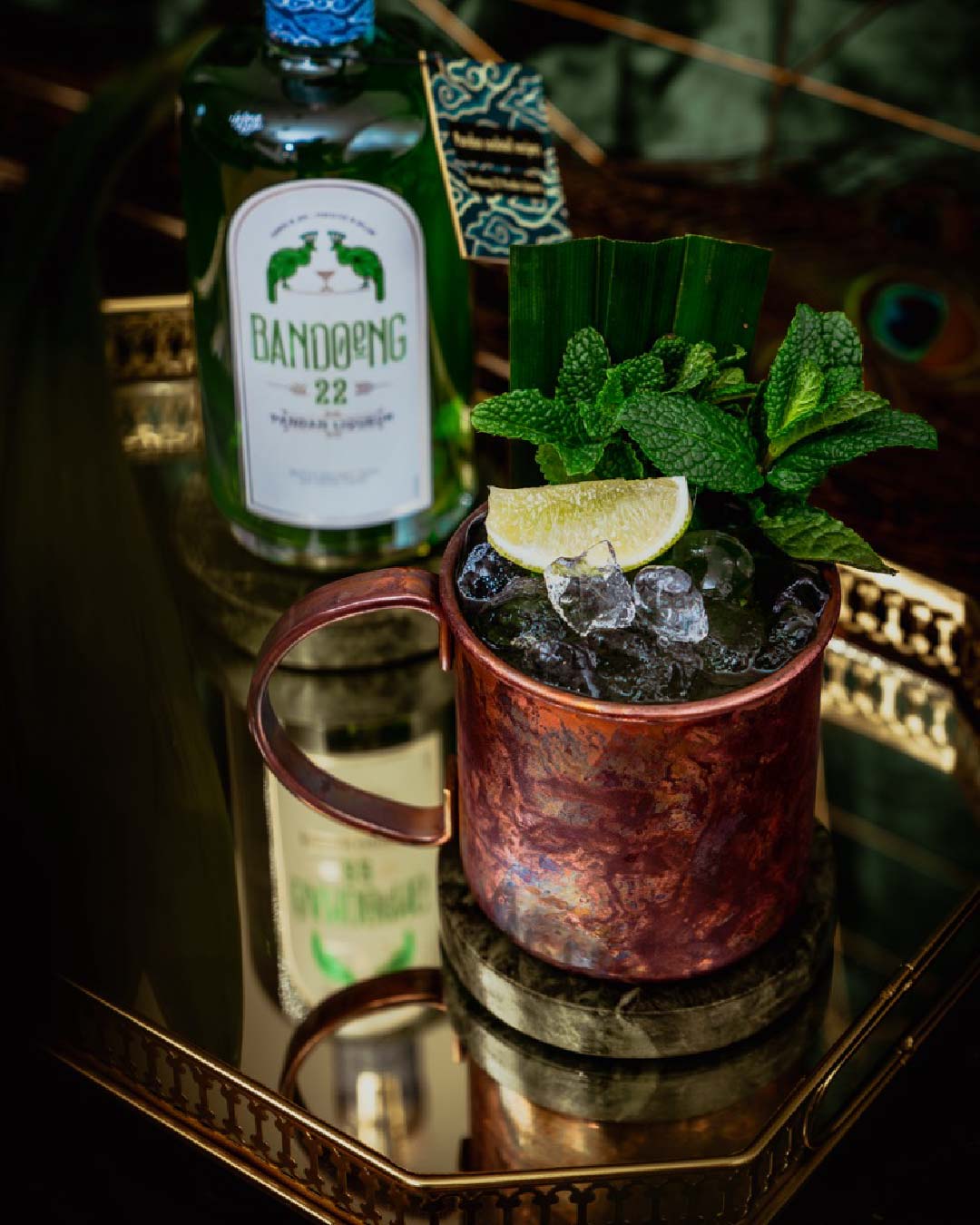 Pandan Moscow Mule cocktail with Bandoeng'22 pandan liqueur and ginger beer