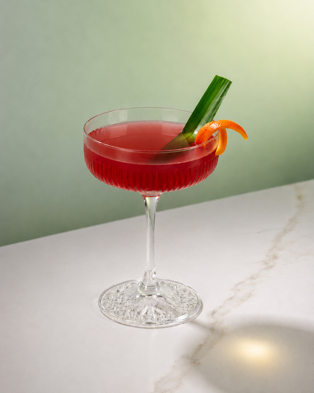 Pandan sour cocktail with Bandoeng'22 pandan liqueur and egg white foam