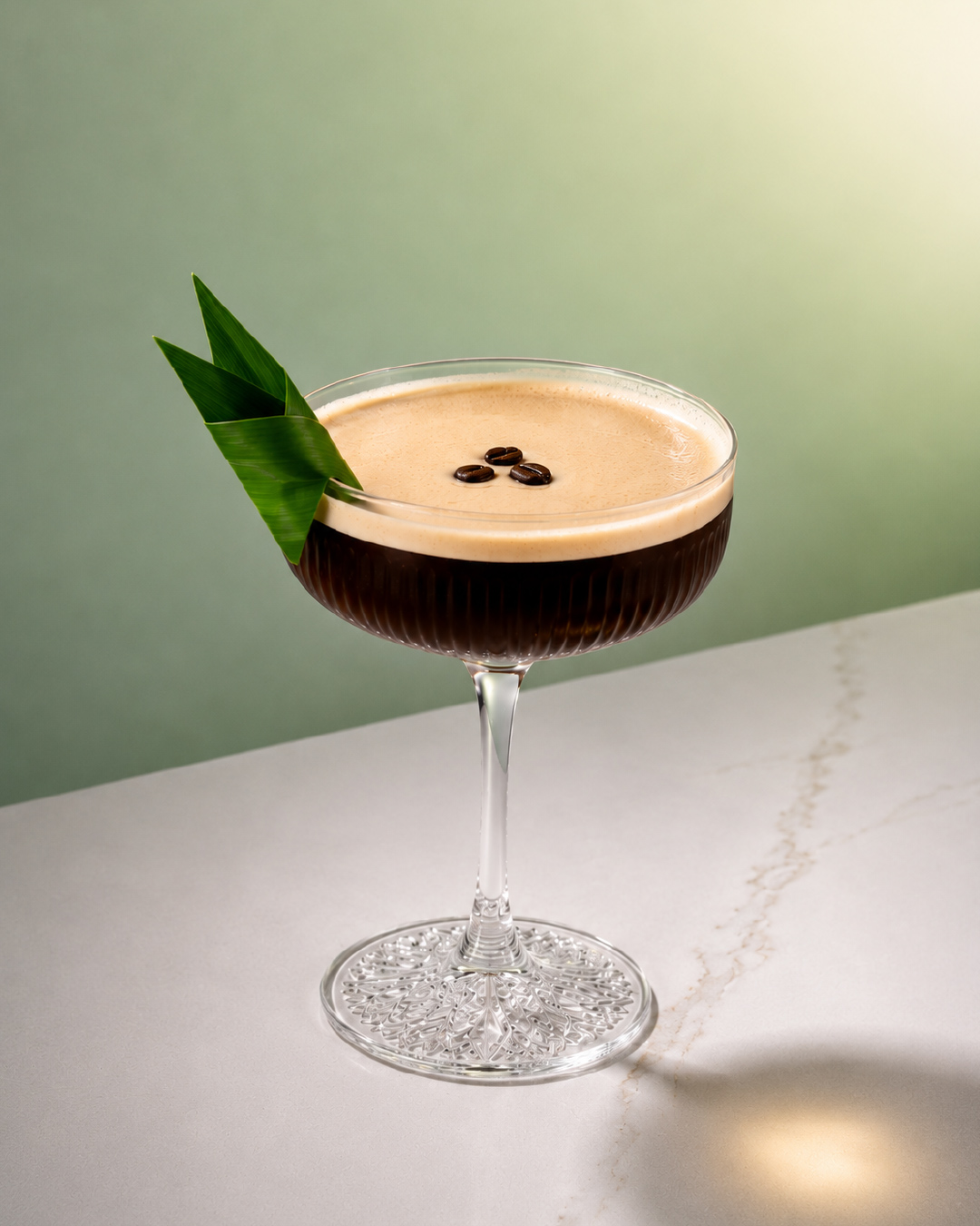 Pandan sour cocktail with Bandoeng'22 pandan liqueur and egg white foam